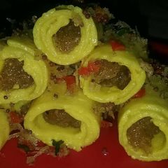 A picture of Mango stuffed khandvi.