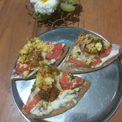 A picture of Rotizza - Roti + Pizza.