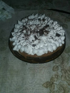 Una foto de Torta Brownie con dulce de leche y merengue italiano