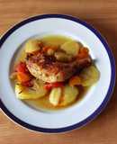 Muslos de pollo con patatas y tomate