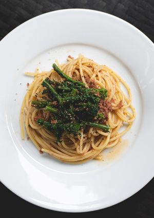 A picture of Pasta with kale and corned beef.