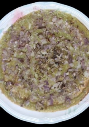 A picture of Moong sprouts onion dosa.