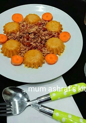 A picture of Moimoi wit egg sauce.