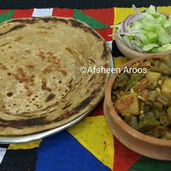 A picture of French beans and potatoes bhujia.
