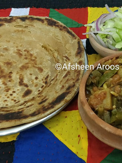 A picture of French beans and potatoes bhujia.