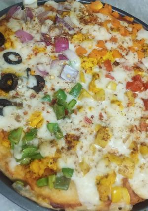 A picture of Rainbow pizza 🌈 🍕🍕.