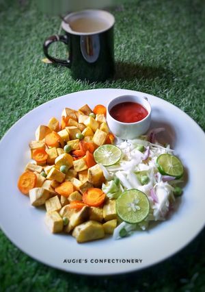 A picture of Roasted sweet potato and carrot with side salad.