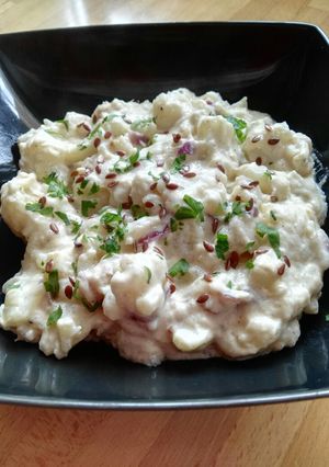 Una foto de Coliflor al curry con salsa de queso