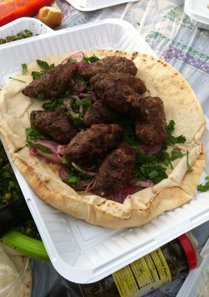 A picture of Grilled Kofta on Charcoal.