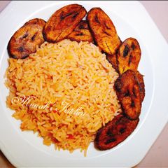 A picture of Simple jollof rice/ fried plantain.
