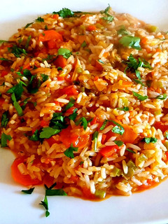 Una foto de Guisito de arroz y almejas. #Mercado #CEBOLLA