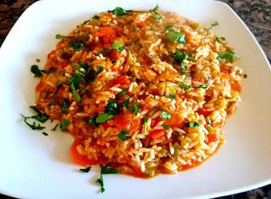 Una foto de Guisito de arroz y almejas. #Mercado #CEBOLLA
