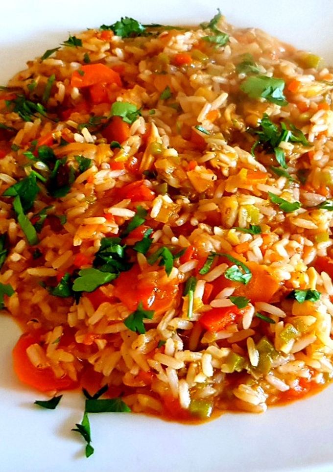 Una foto de Guisito de arroz y almejas. #Mercado #CEBOLLA