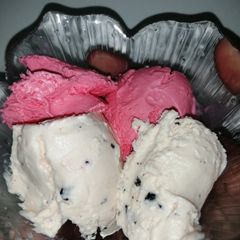 A picture of Strawberry and chocolate flakes ice cream.