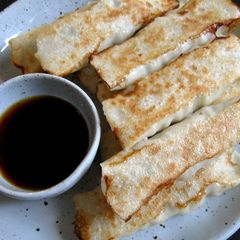 Pork & Cabbage Rolled Gyoza A picture of Pork & Cabbage Rolled Gyoza.