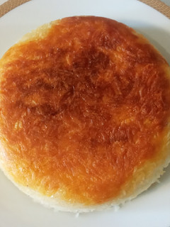 عکسی از دستور کته با ته دیگ سیب زمینی رنده شده