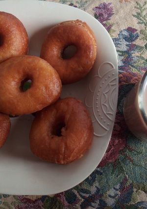 A picture of Morning mini donuts with tea.