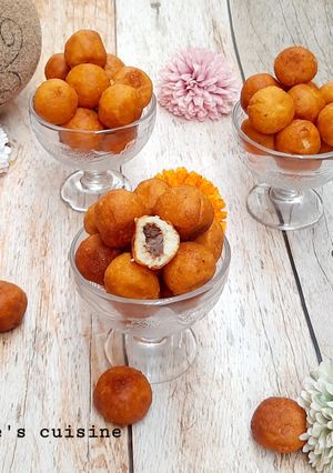 A picture of Chocolate stuffed milk balls.