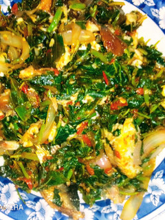 A picture of Spinach source and smoke fish.