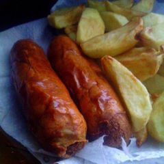 A picture of Homemade Sausage and Black Pepper Potato Wedges.
