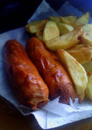 A picture of Homemade Sausage and Black Pepper Potato Wedges.