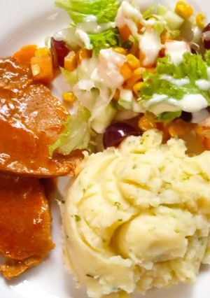 Una foto de Lomo de cerdo en salsa criolla