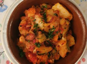 Una foto de Bacalao con garbanzos y papa