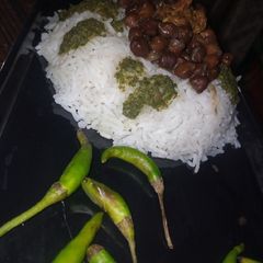 A picture of Black chana with white Rice.