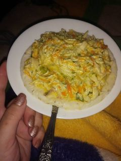 Una foto de Fricasé de pollo en arepa