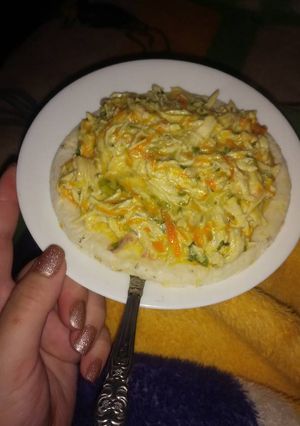 Una foto de Fricasé de pollo en arepa