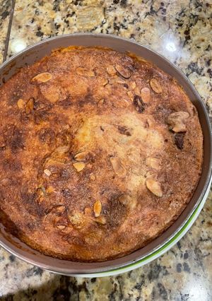A picture of Cassava Cake with Coconut and Pecans.