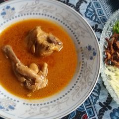 A picture of Plain chicken curry.