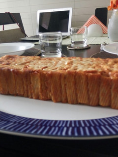Una foto de Budín de fideos y salsa