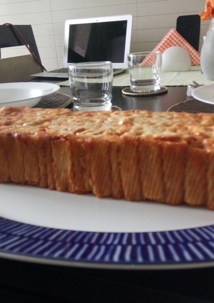 Una foto de Budín de fideos y salsa