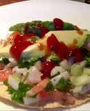 Ceviche de pescado y cerveza michelada con clamato 