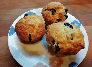 Una foto de Muffins de quesillo con arándanos