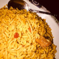 A picture of Jollof rice with spaghetti.