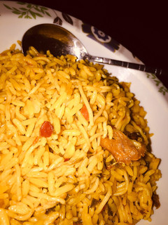 A picture of Jollof rice with spaghetti.