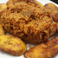 A picture of Jollof rice and fried plantain.