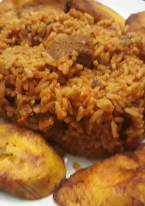 A picture of Jollof rice and fried plantain.