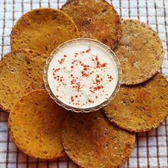 A picture of Jowar Bhakri With Vegetables. (Accompanied With Cucumber, Carrot Raita).