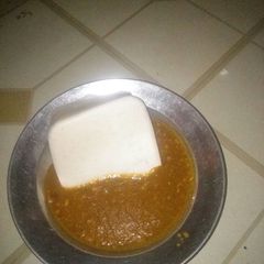 A picture of Tuwan masara with dry okro soup.