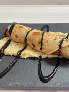 Una foto de Crep de morcilla con manzana y cebolla caramelizada