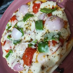 Onion capsicum pizza A picture of Onion capsicum pizza.