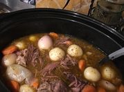 A picture of pot roast in oven