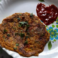 A picture of Mix flour mix veggies spicy cheela.