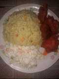 Fried rice and salad with sauced fried turkey and mackerel fish