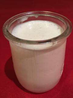 Una foto de Alioli con leche