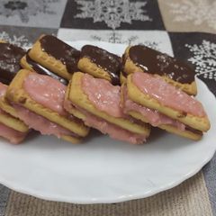 A picture of Cream Sandwich biscuits :- Chocholate and strawberry.