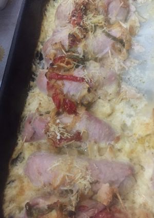 Una foto de Niños envueltos de carne al horno